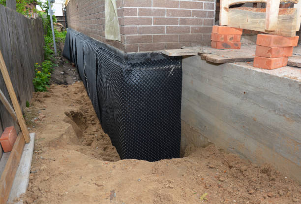Happy homeowners after waterproofing job in Cudahy